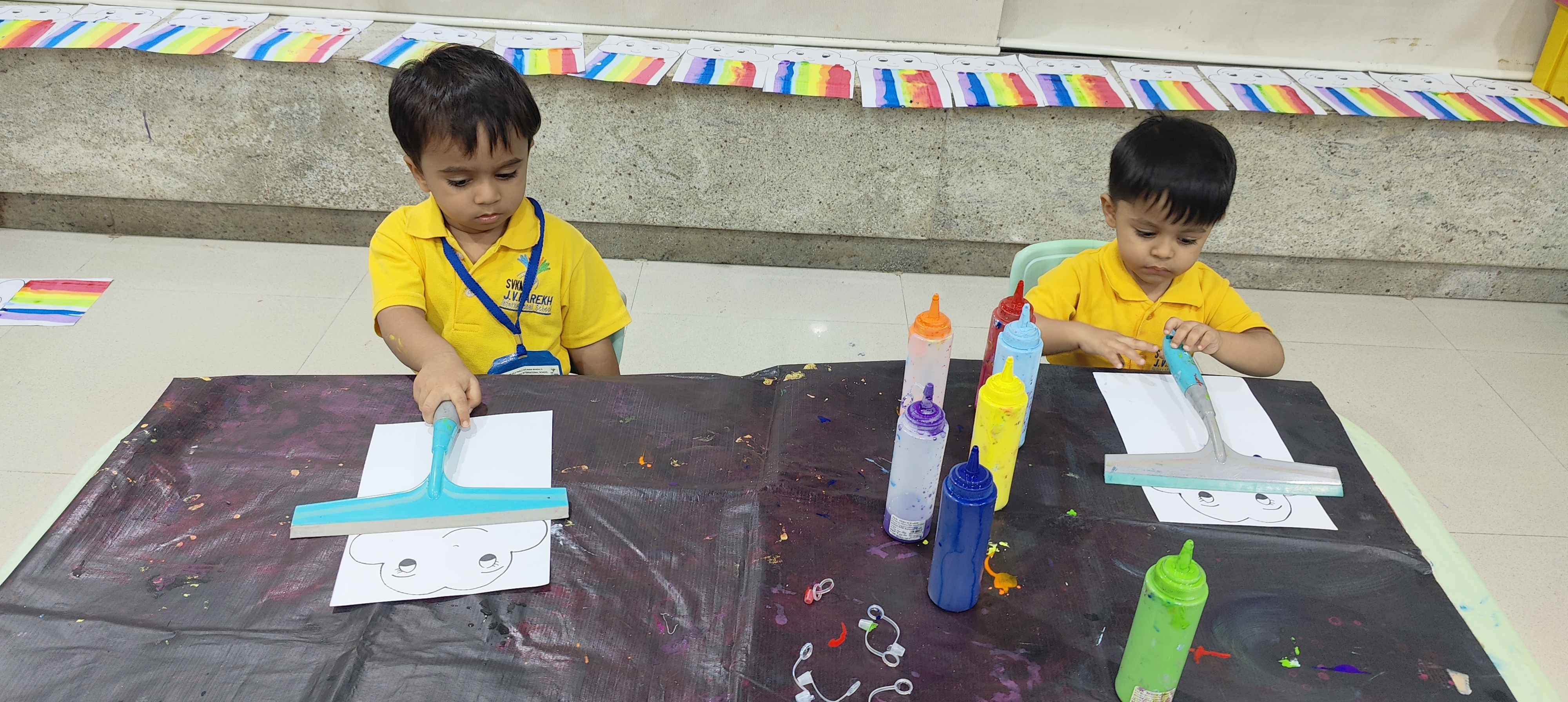 Rainbow Squeegy Painting- Monsoon Splish Splash Activity